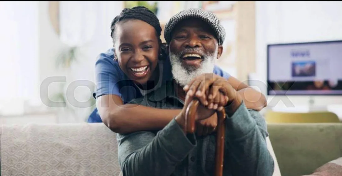 Caregiver and older adult sharing a friendly moment